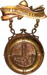 Badge Awarded to Chief Engineer Charles T. Lawson for Rescue of Passengers on the S.S. Olympia. Gold