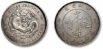 清湖北省造光绪元宝库平三钱六分银币一枚，均匀灰色氧化，底版亮洁，近未使用品