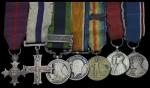 The mounted O.B.E., M.C. group of seven miniature dress medals worn by Brigadier E. J. Ross, 2nd Kin