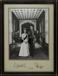 Signed photograph of The Queen and Prince Philip  Large-format retirement gift, comprising glazed an