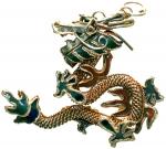 Varia Anhanger in Form eines bunt emaillierten Drachen mit vergoldeten Schuppen. 35 X 45 mm; 8,70 g